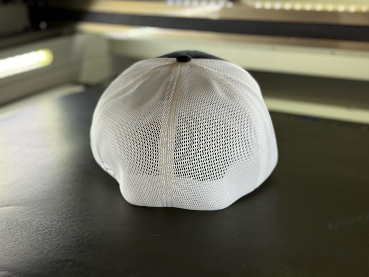 Crest (Black/White, 172 Flex Fit LG-XL) Hexwood hat outdoors